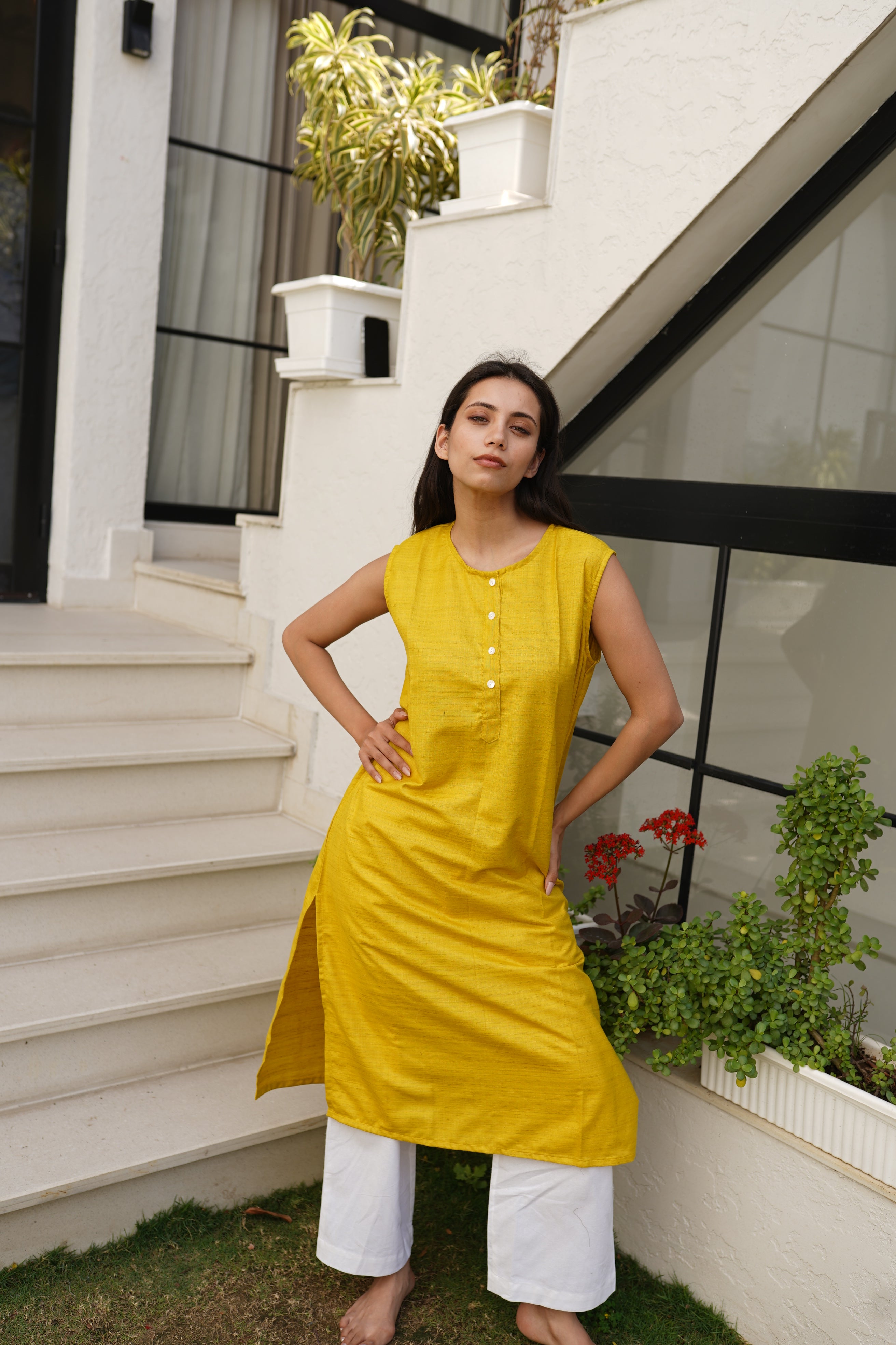 Women Solid Mustard Yellow Sleeveless Cotton Blend Kurta with Front Button Detailing