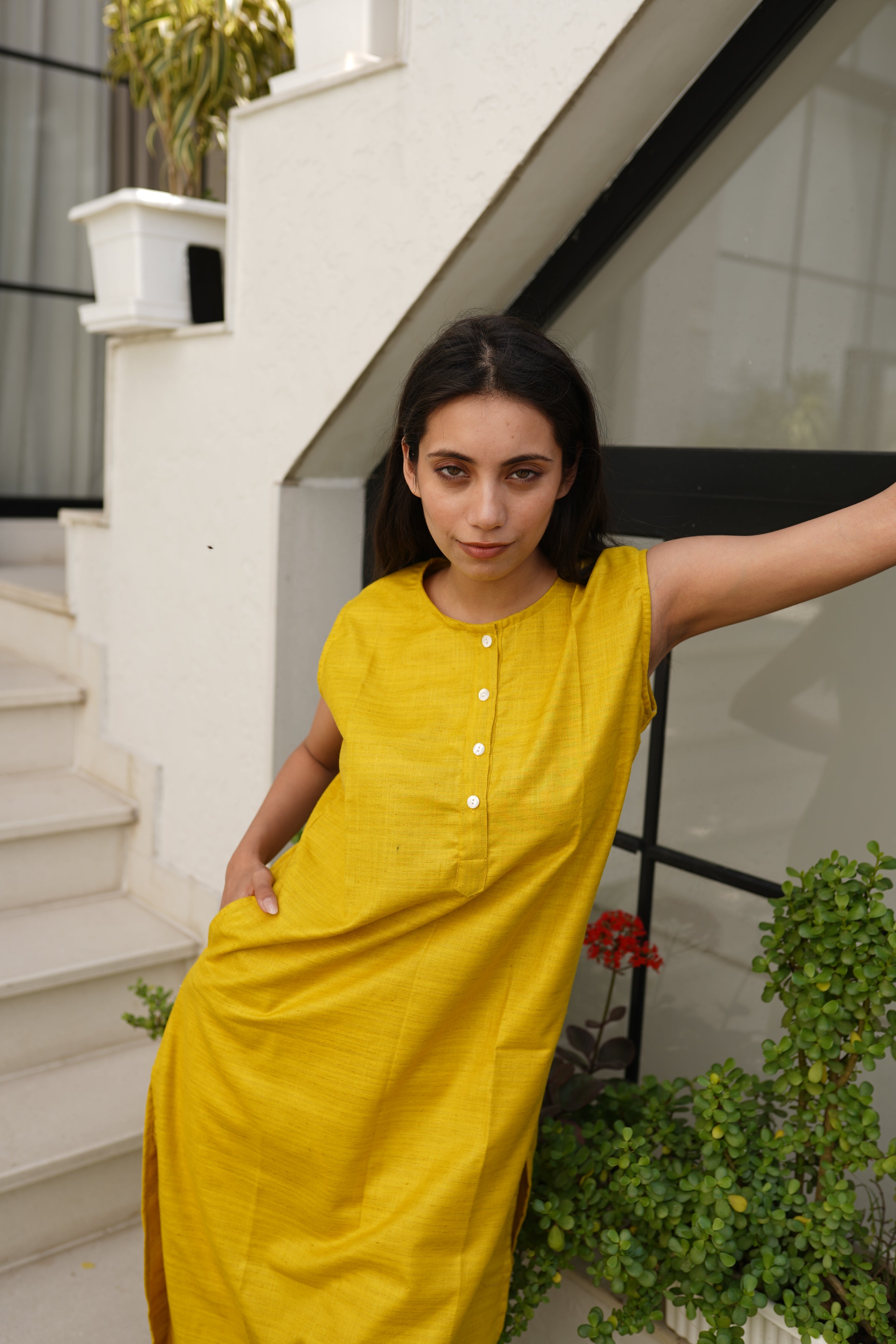 Women Solid Mustard Yellow Sleeveless Cotton Blend Kurta with Front Button Detailing