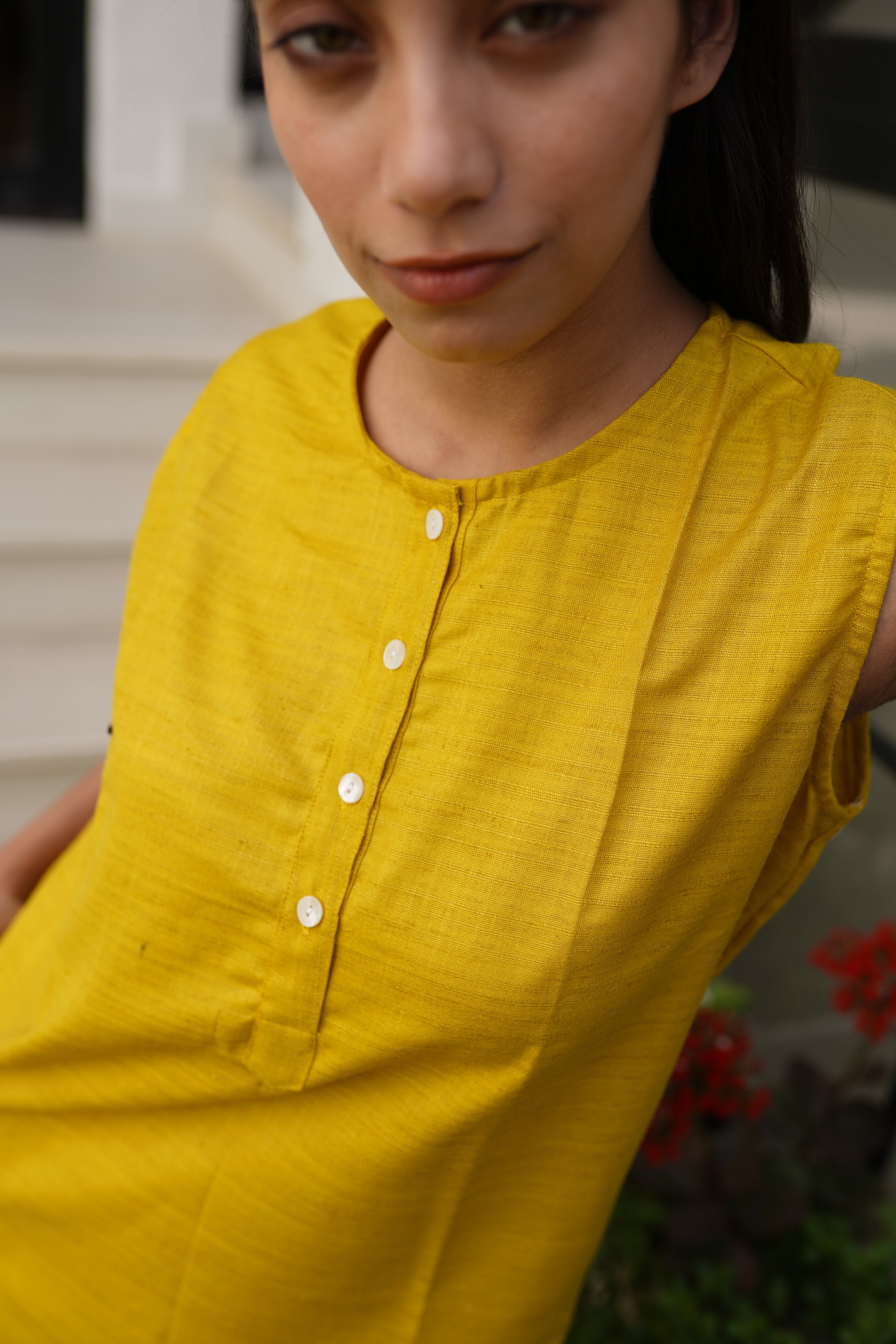Women Solid Mustard Yellow Sleeveless Cotton Blend Kurta with Front Button Detailing